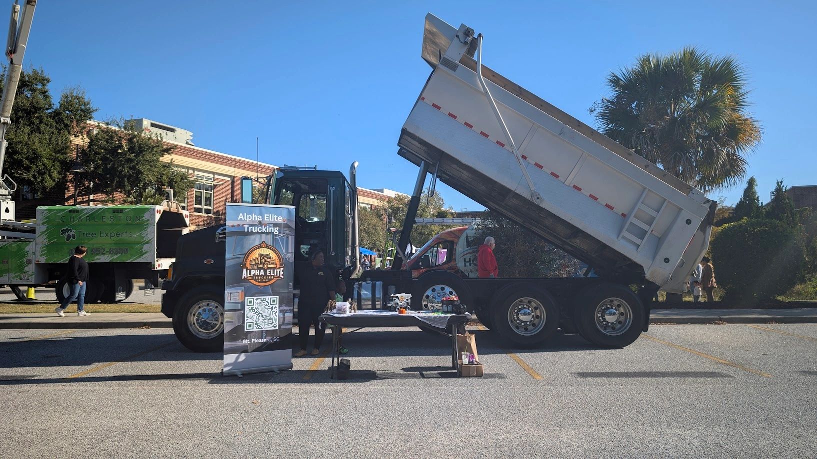 Alpha Elite Trucking truck at community event